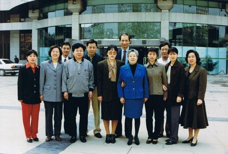 Zhang Yijie (C) is pictured in large, shaded glasses, when she was secretary to Chen Muhua, who later became the vice chairman of the PRC. (NTD Television)