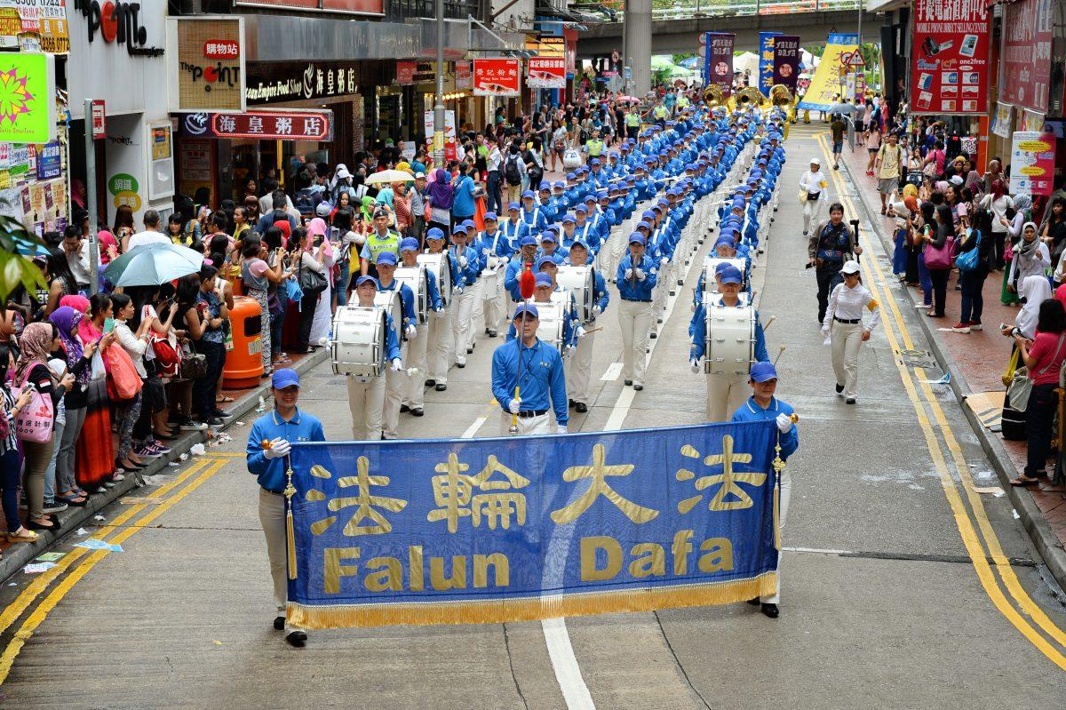A parade led by Falun Gong's Tianguo marching band in Hong Kong on May 10, 2015. (The Epoch Times)