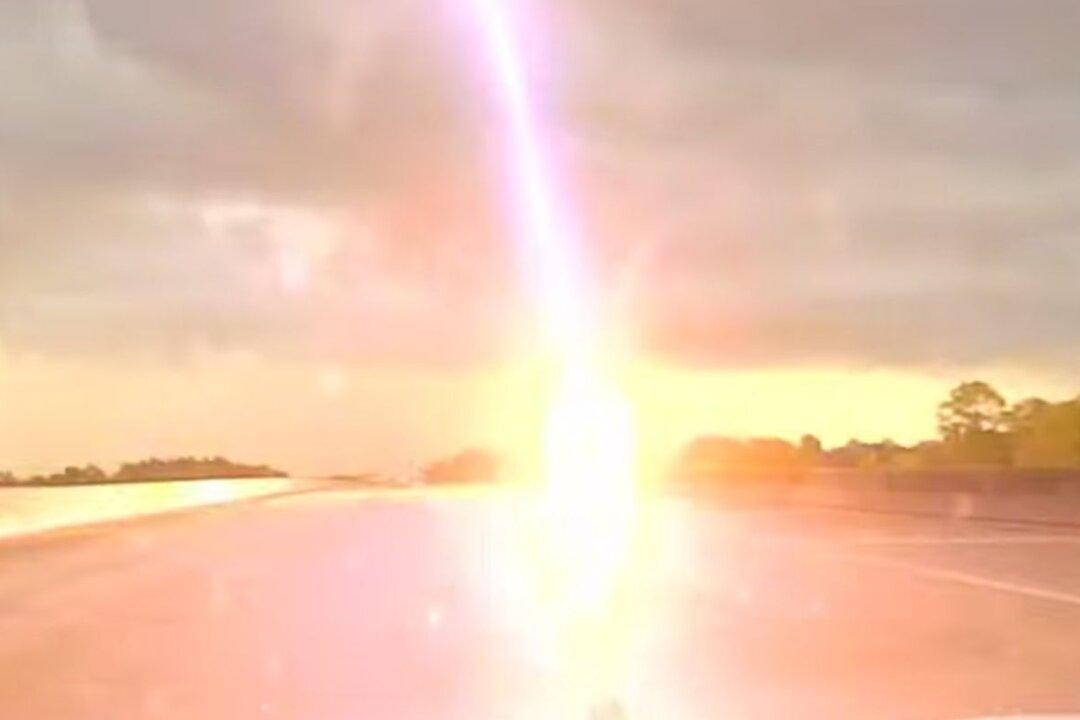 Cop’s Dashcam Footage Captures Lightning Strike