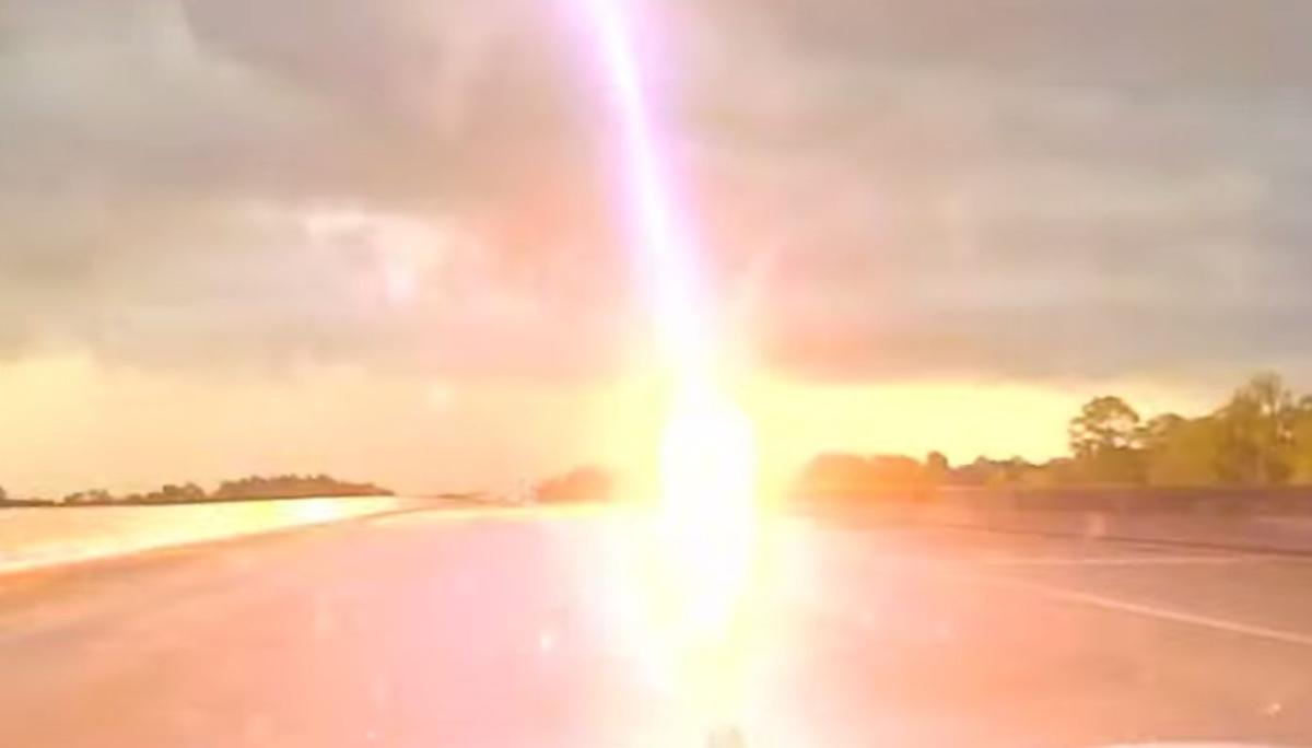 Cop’s Dashcam Footage Captures Lightning Strike