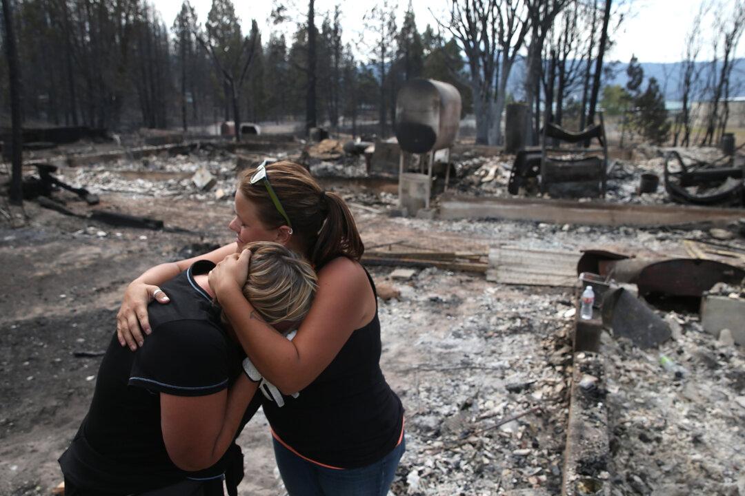 California Wildfire Evacuees Return Home as Flames Ease