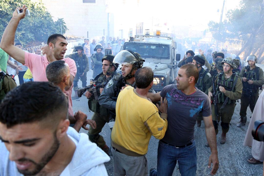 West Bank Clashes With Israeli Troops Kill Palestinian Youth
