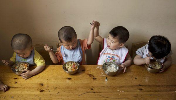 Orphaned Chinese boys at a foster care center in Beijing on April 2, 2014. (Kevin Frayer/Getty Images)