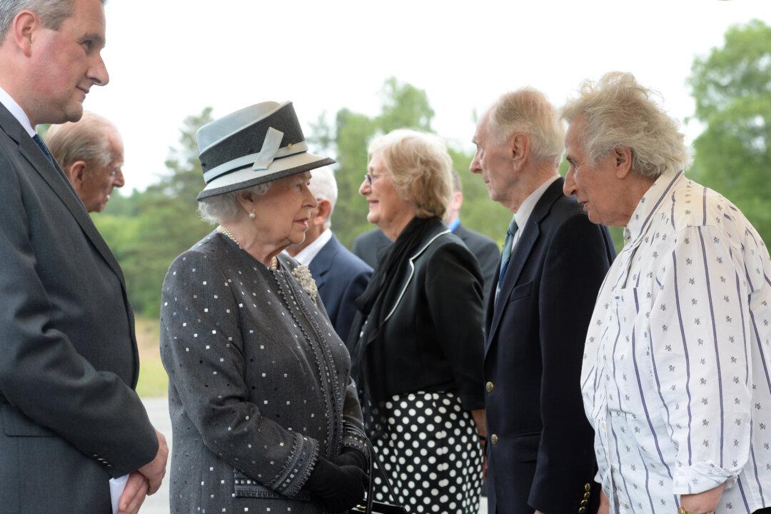 Queen Meets Survivors, Liberators of Former Nazi Camp
