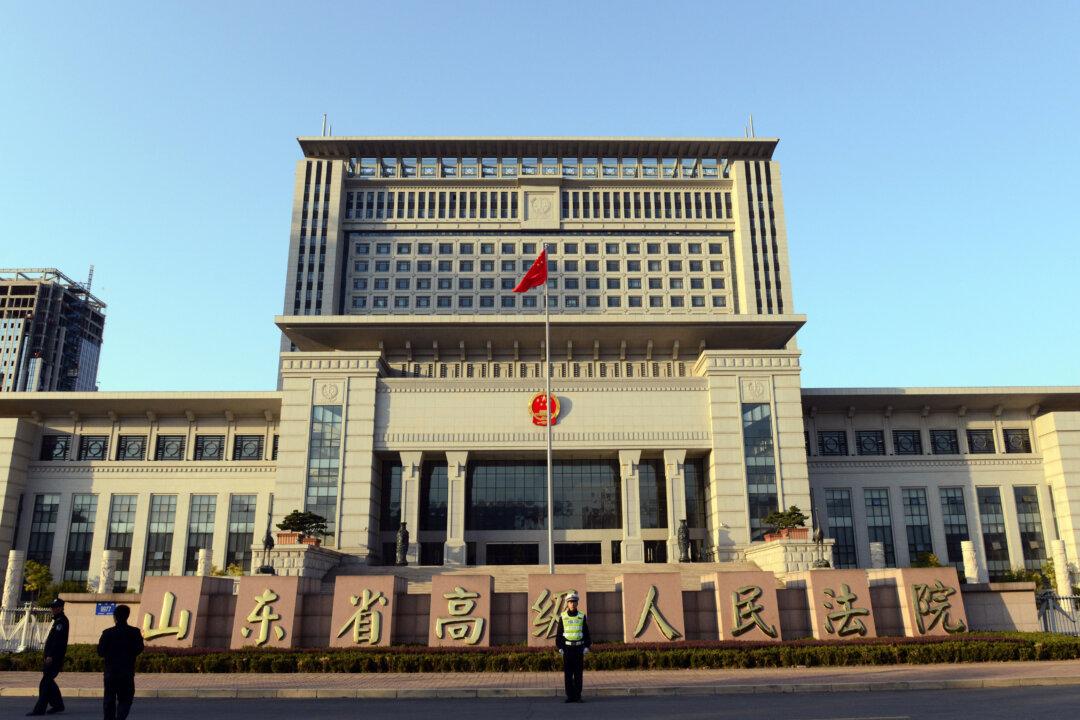 Female Lawyer Is Hauled From Courtroom in Political Case in China