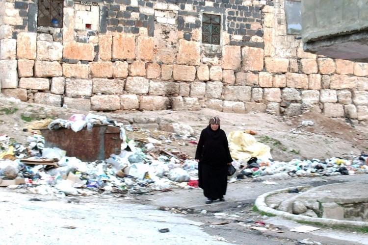 Syria Launches Attacks on Two Cities, Activists Say