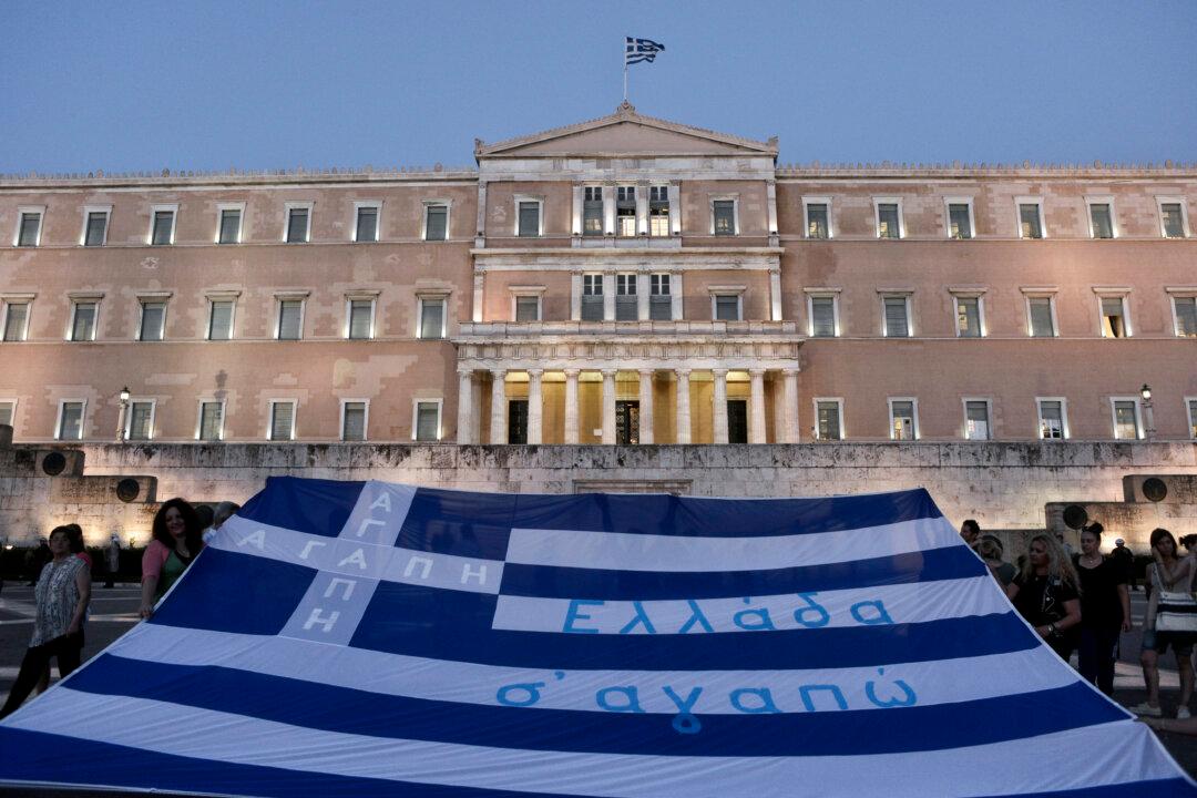 Greece Gets Relief From Creditors After First Austerity Test