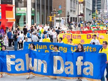 Thousands of Falun Gong Adherents Parade Through New York City (Photo Essay)
