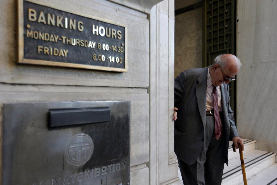 Greek Banks Reopen but Cash Limits Remain and Taxes Soar