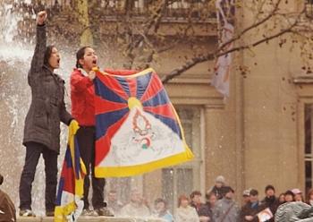 Protester Grabs Olympic Torch in London