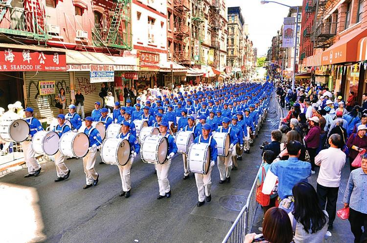 Parade of 6,000 Brings Powerful Music, Delicate Wreaths