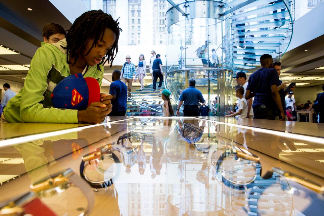 Strong iPhone Sales; Apple Stock Down With Few Watch Details