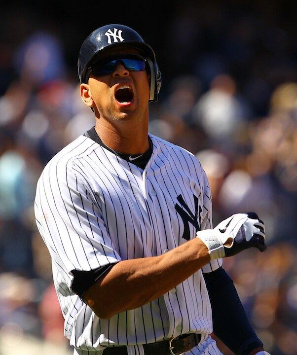 Reds Rally Past Yankees in Rubber Match