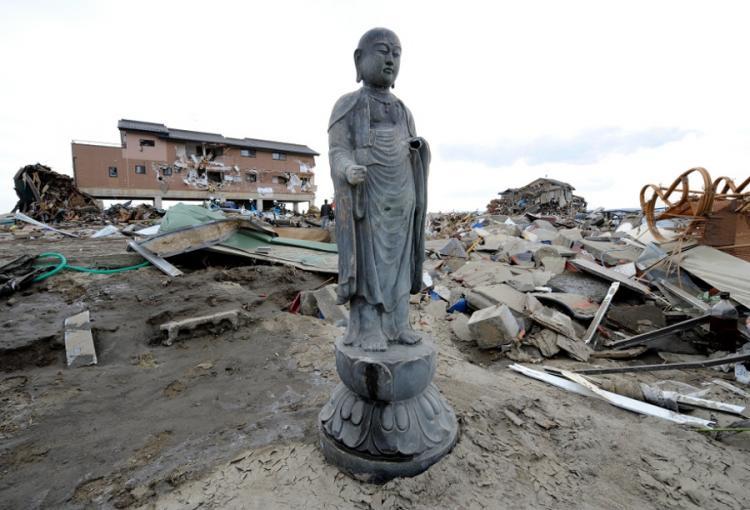 Buddha Statues Stand Amid Rubble After Tsunamis