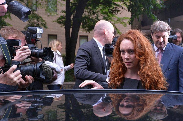 Media on Trial: Eight Charged for UK Phone Hacking