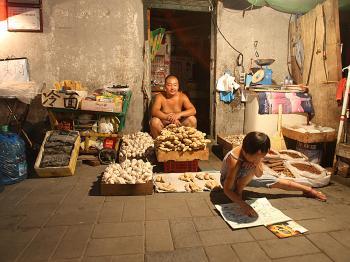 Behind Olympic Glare, Party Signals Economy out of Control