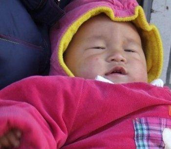 Victim of Melamine-tainted Milk Powder Renounces Communist Organization