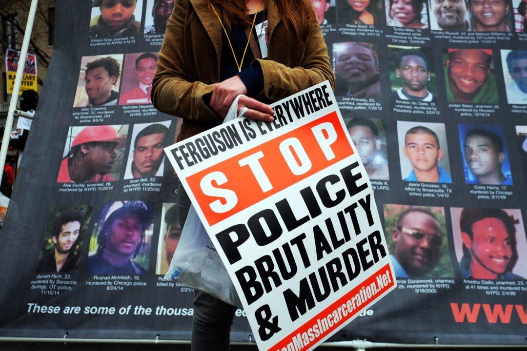 Half of Blacks Say Police Have Treated Them Unfairly