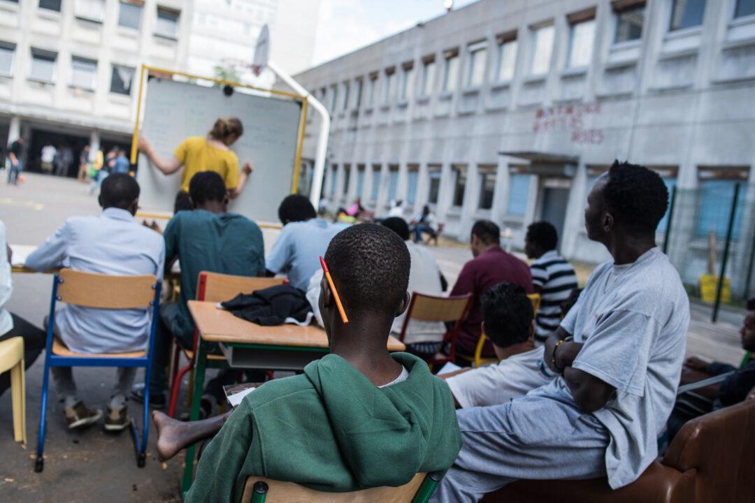 Paris Turning Schools, Hotels Into Housing for Migrants