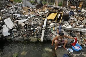 China Torrent Obliterates Remains of Quake Town