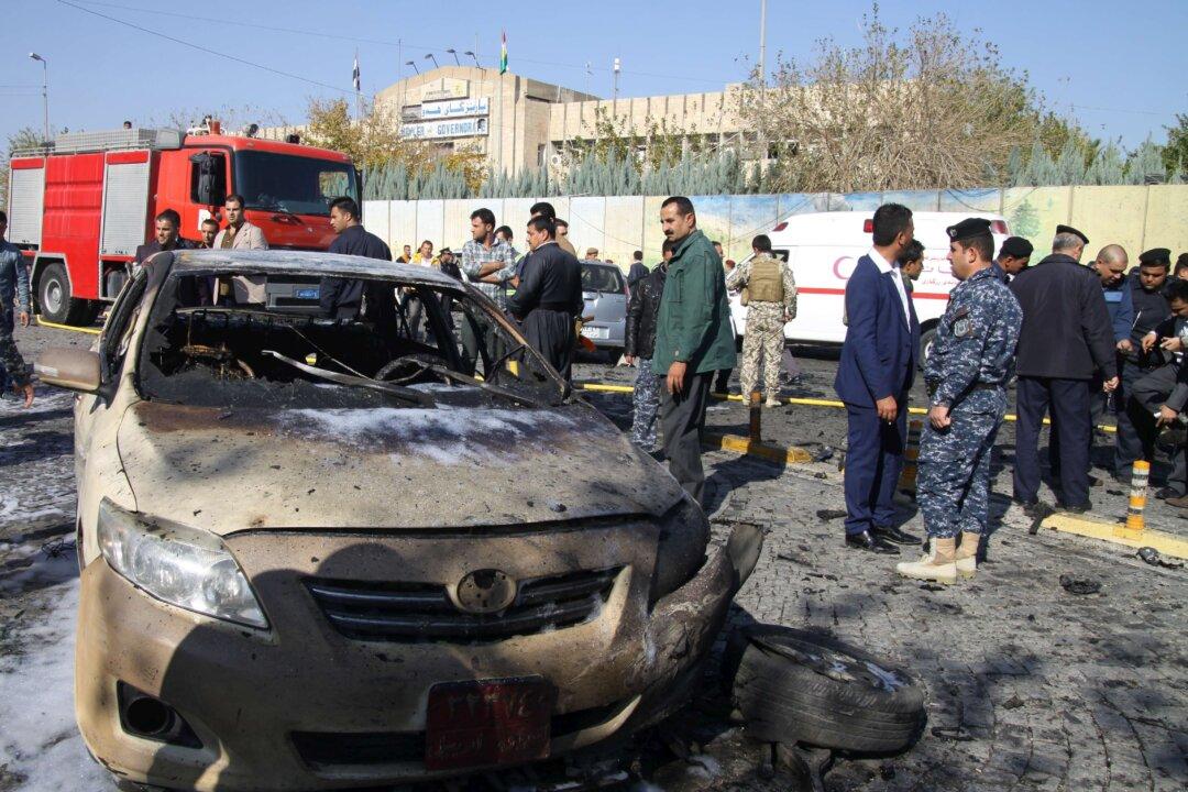 Iraq Officials: Suicide Bombing at Baghdad Service Kills 17