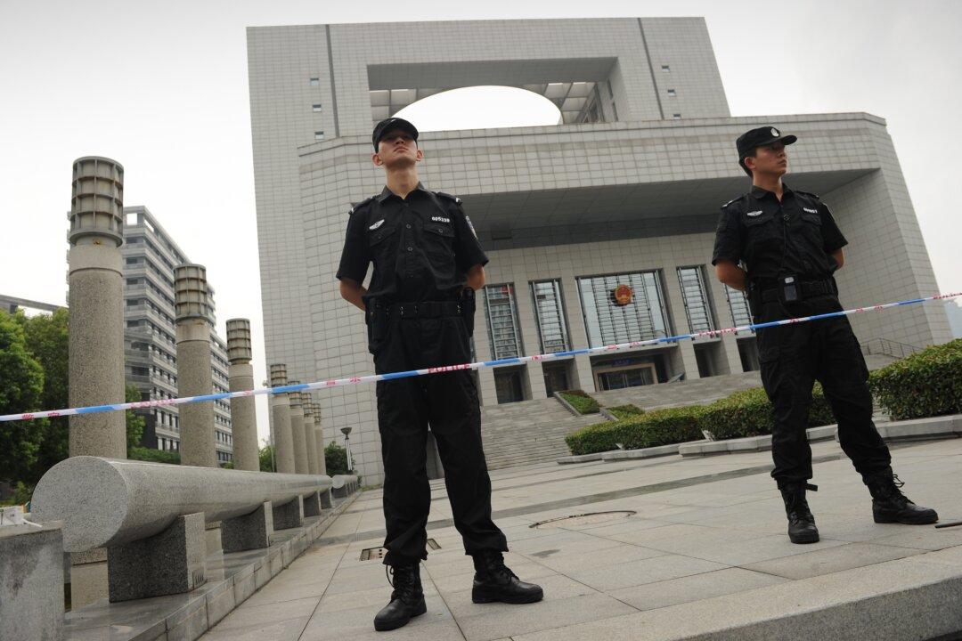 China Rights Lawyer Held on Suspicion of Spying