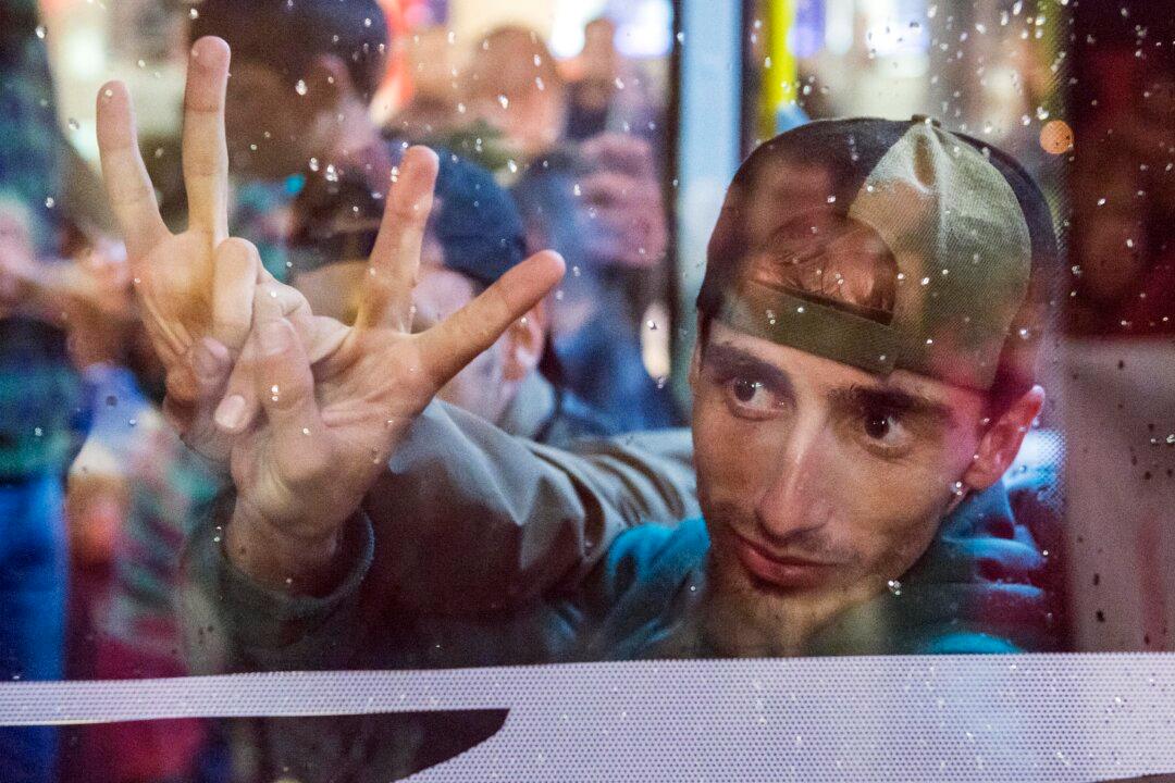 Migrants Flow West on Hungarian Trains; 13,000 Reach Austria