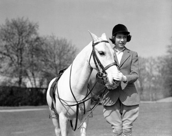 Then-Princess Elizabeth on her 13th birthday in Windsor Great Park in England on April 21, 1939. (AP Photo)