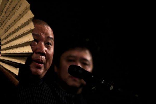Chinese comedian Guo Degang performs crosstalk, a traditional Chinese comic talk show, in Changchun in China’s Jilin Province, on March 9, 2008. (China Photos/Getty Images)