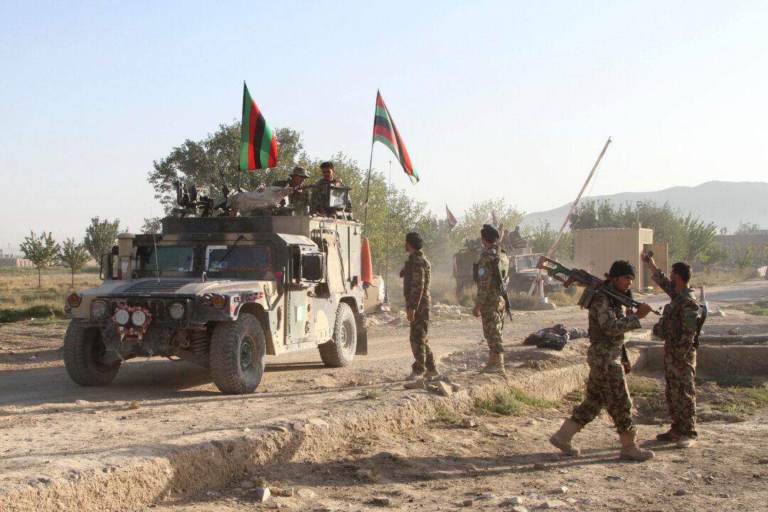 US Airstrikes Back Afghan Push to Retake City From Taliban