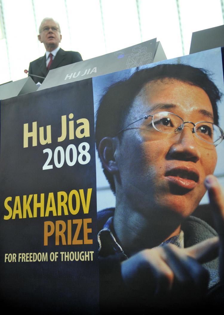 European Parliament President Hans-Gert Pottering gives a speech beside Hu Jia's empty chair during the Sakharov prize-giving ceremony at the European Parliament in Strasbourg on Dec. 17, 2008. (Dominique Faget/AFP via Getty Images)
