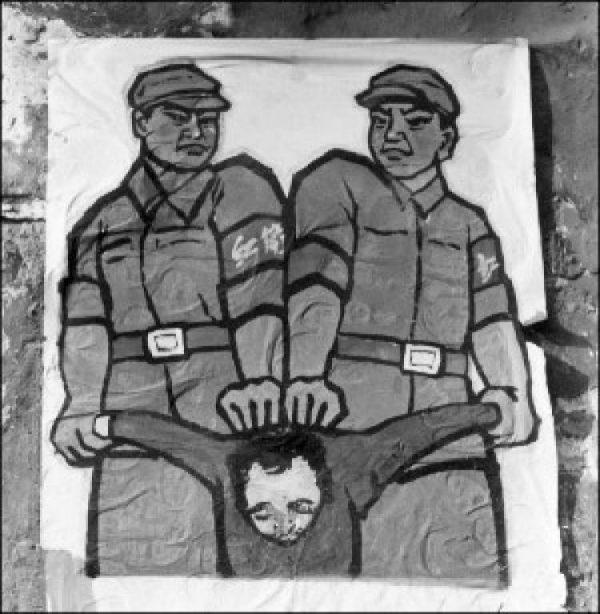 This poster, displayed in late 1966 in Beijing, shows Red Guards how to deal with a so-called 'enemy of the people' during the Cultural Revolution. (Jean Vincent/AFP via Getty Images)