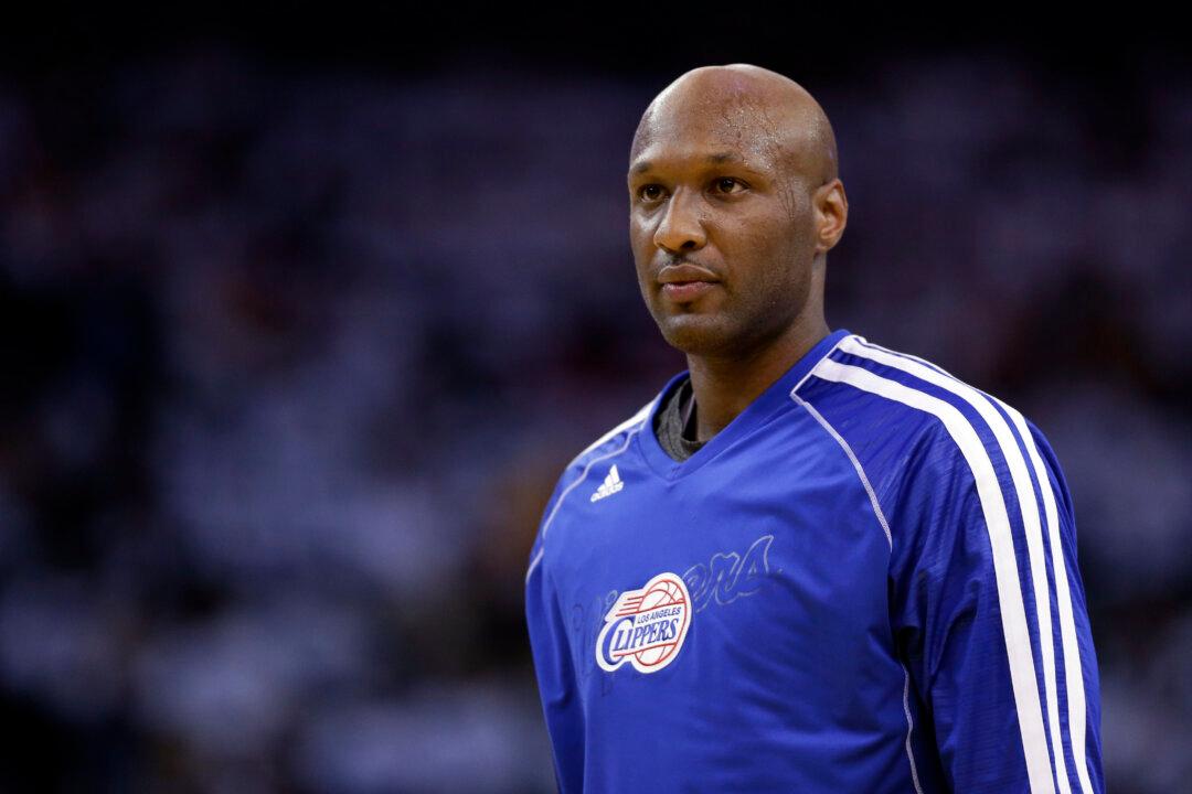 Ex-NBA Star Lamar Odom Is Alert and Improving, His Aunt Says