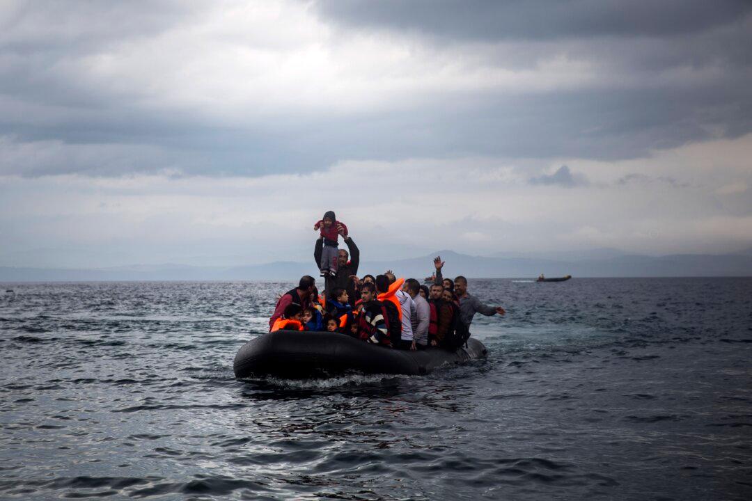 ‘Let Us Go!’ Migrants Ford Icy River, Burn Tents in Slovenia