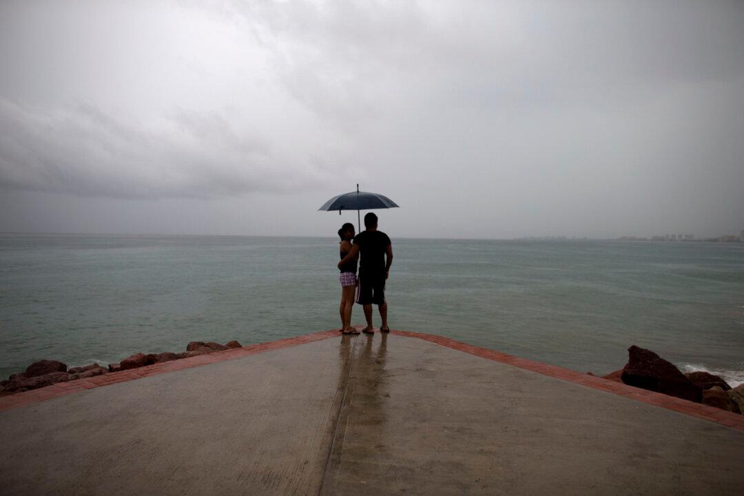 Hurricane Patricia Drenches Mexico as It Weakens to Tropical Storm