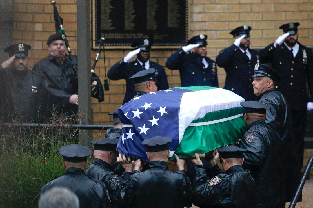 Funeral of Slain New York City Officer Draws Thousands