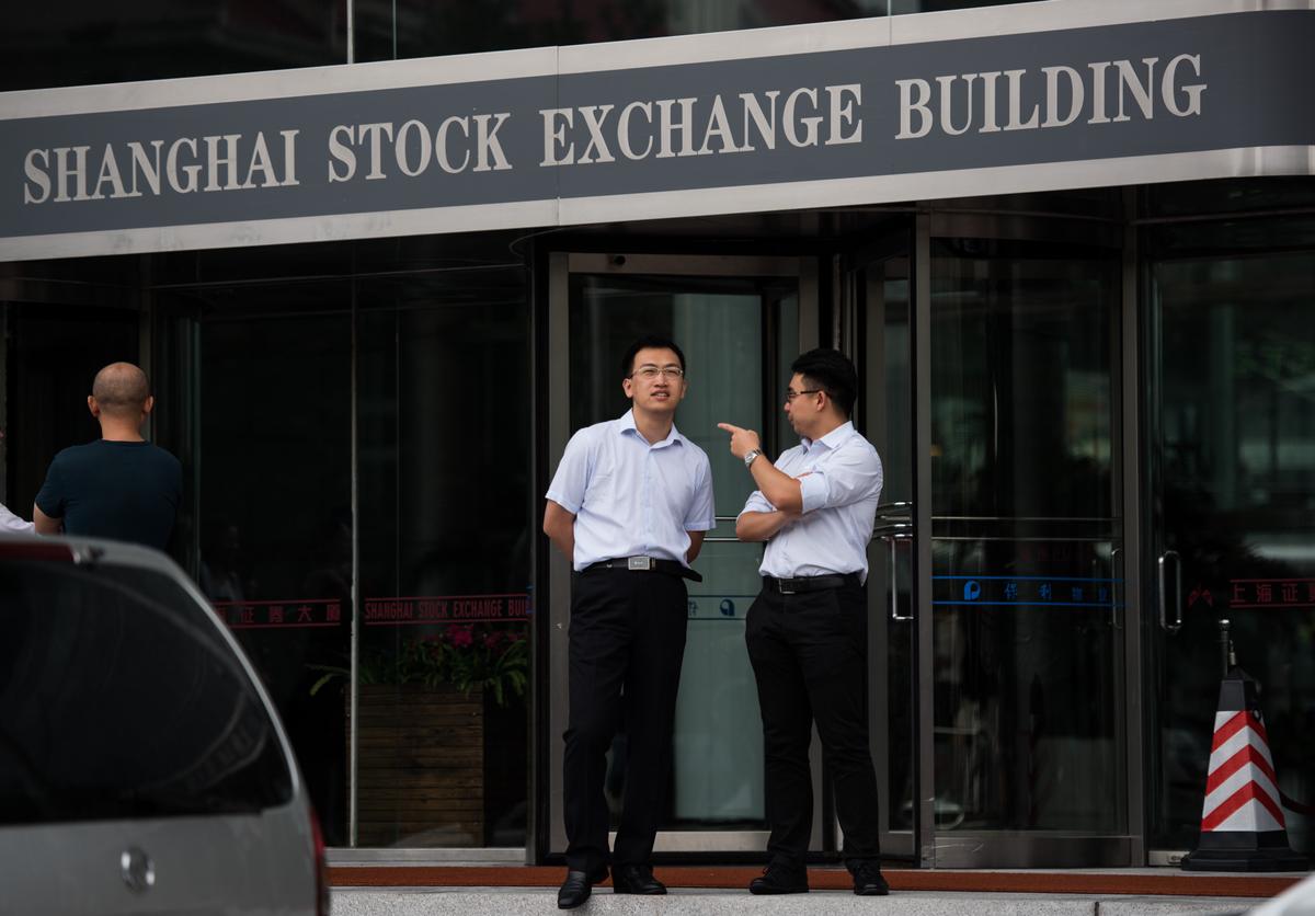 Chinese Investment Firm Under Investigation for Fraud, 12 Executives Arrested