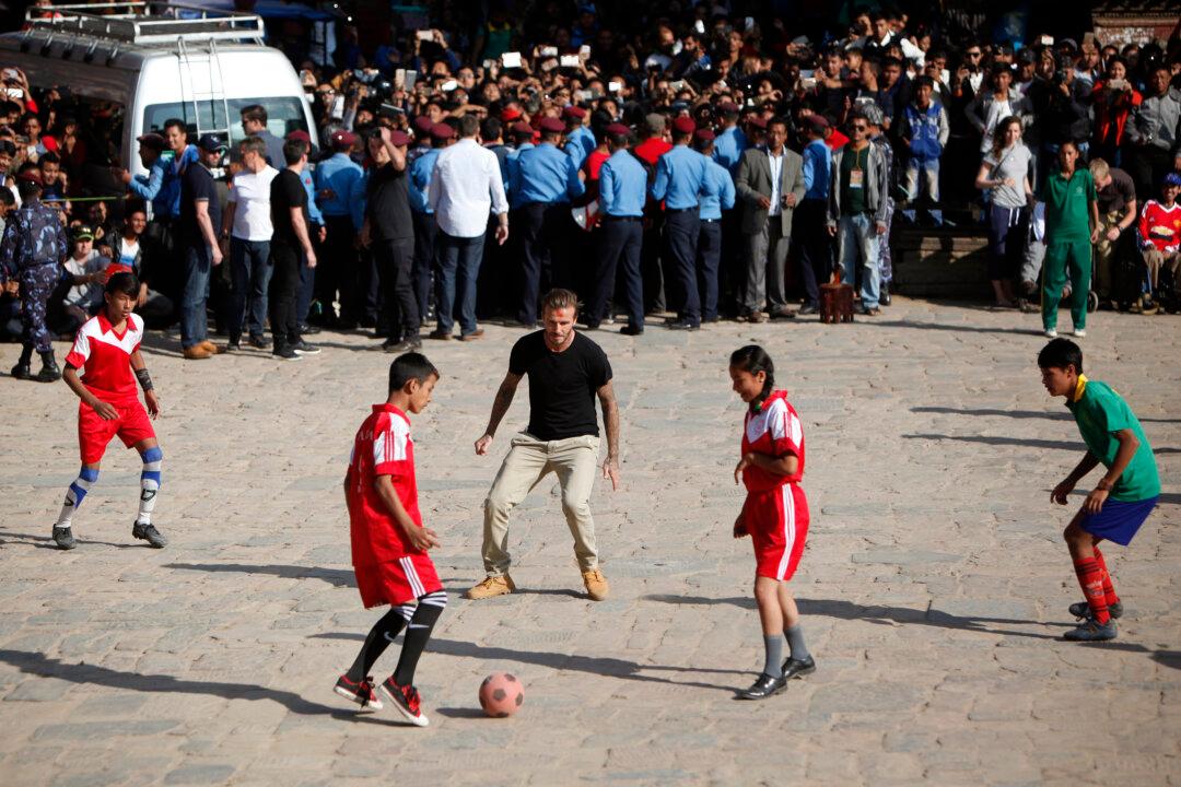 See David Beckham Play Soccer With Nepalese Children