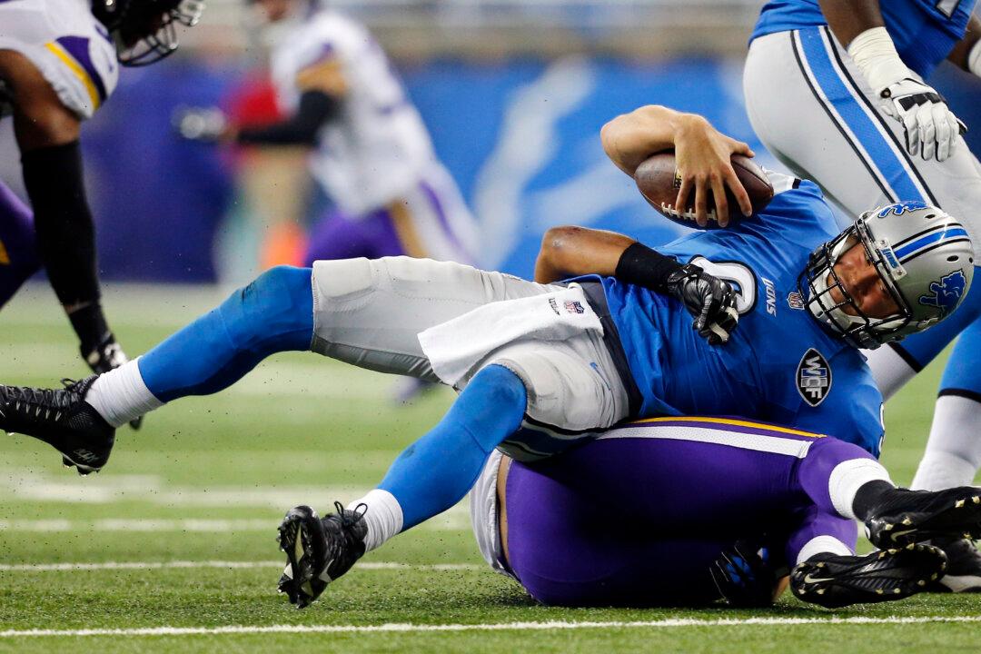 Video: In Lions-Eagles Game, Woman With Banner Gets on Field & Fans Boo