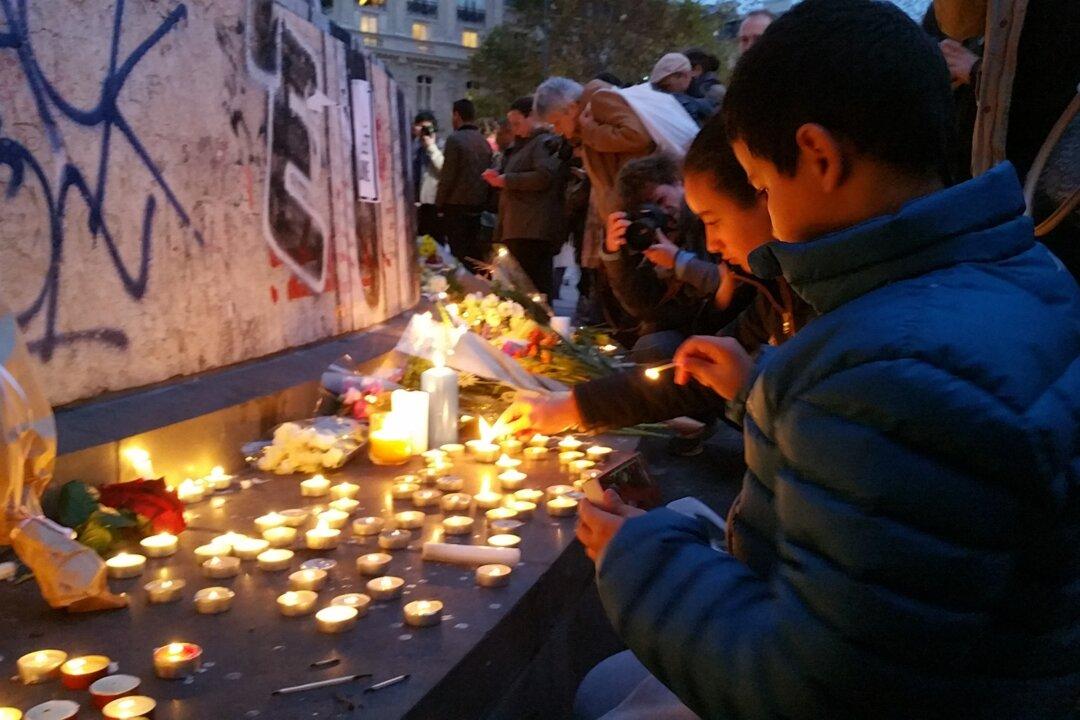 Somber Silence After Paris Attacks: ‘November 13 will be France’s September 11’