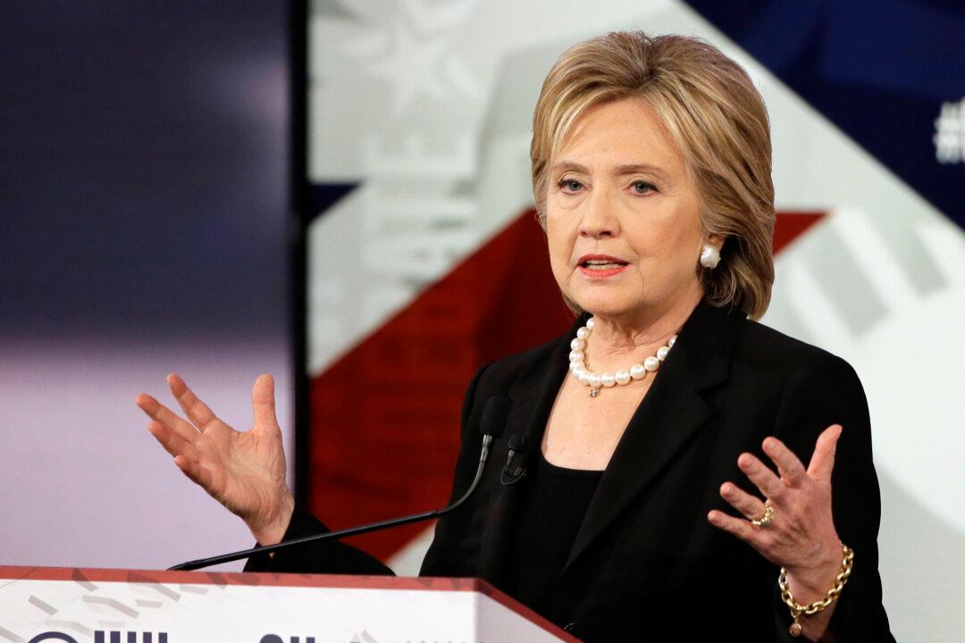 Clinton, Digging at Sanders, Says Don’t Scrap Health Law