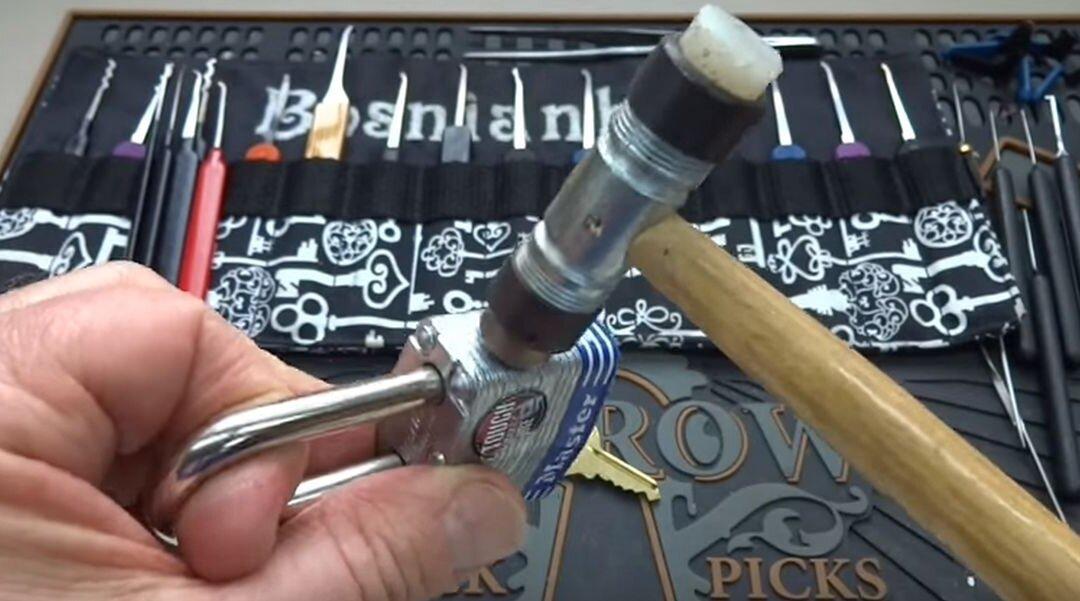 Viral Video Apparently Shows Guy Opening Up Master Lock With a Small Hammer