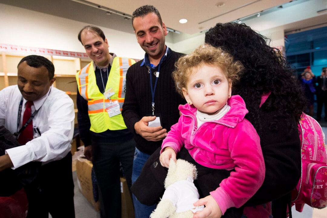 First Government Plane Carrying Refugees Arrives in Canada