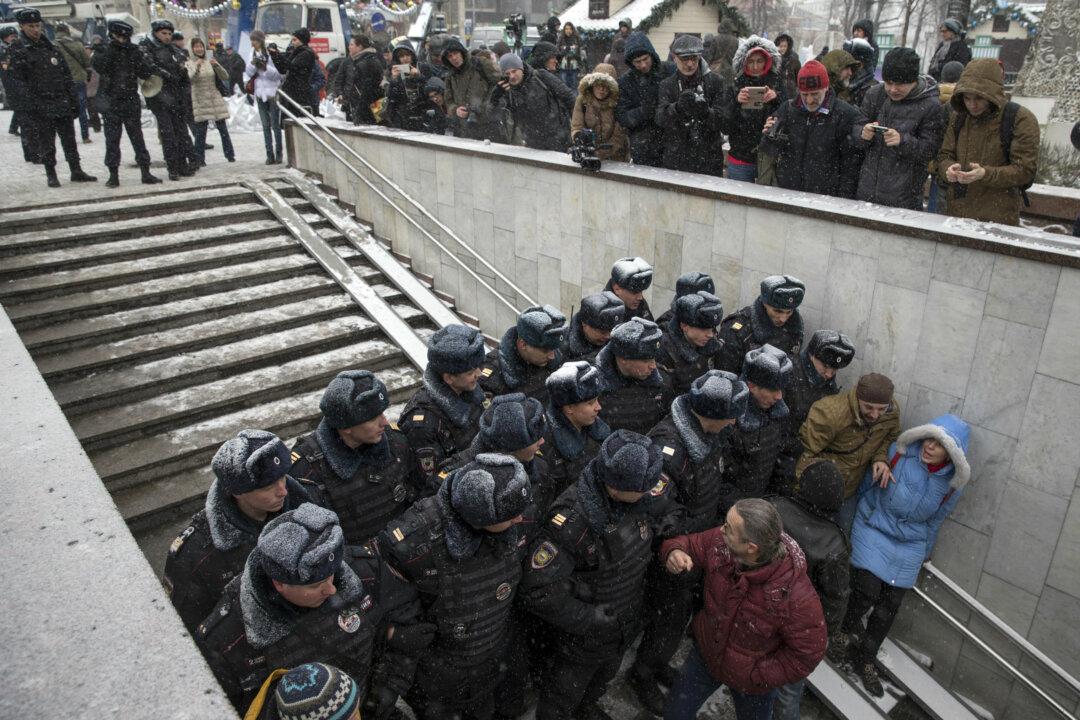 Dozens of Russian Protesters Detained on Constitution Day