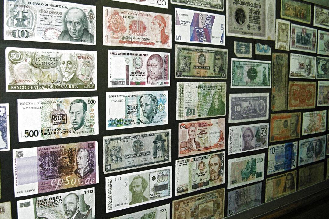 Around the World in 80 Payments—Global Moves to a Cashless Economy