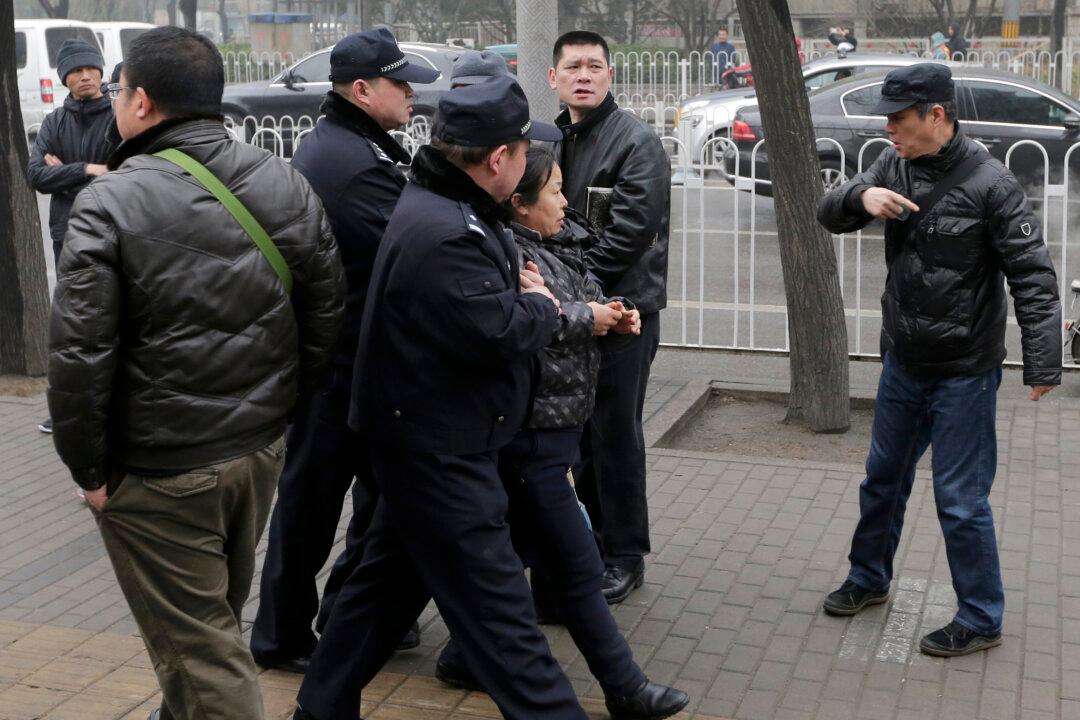 China Arrests Rights Lawyers 6 Months After Taking Them Away