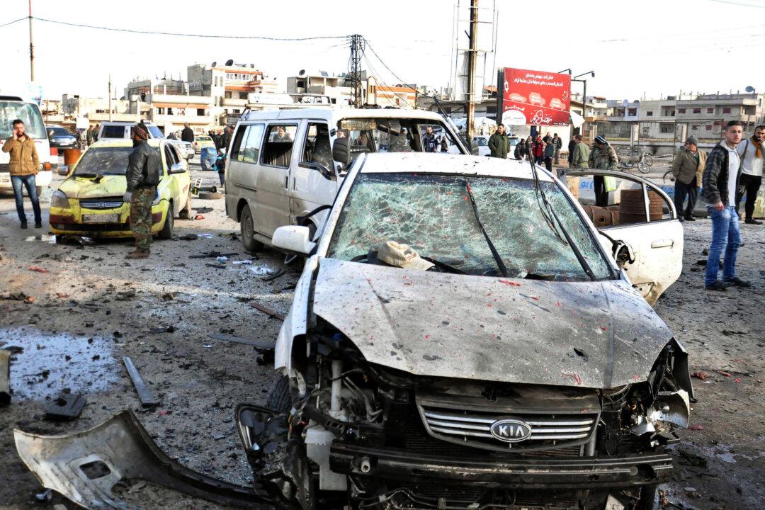 Deadly Blasts Kill 20 in Syrian City Ahead of Peace Talks