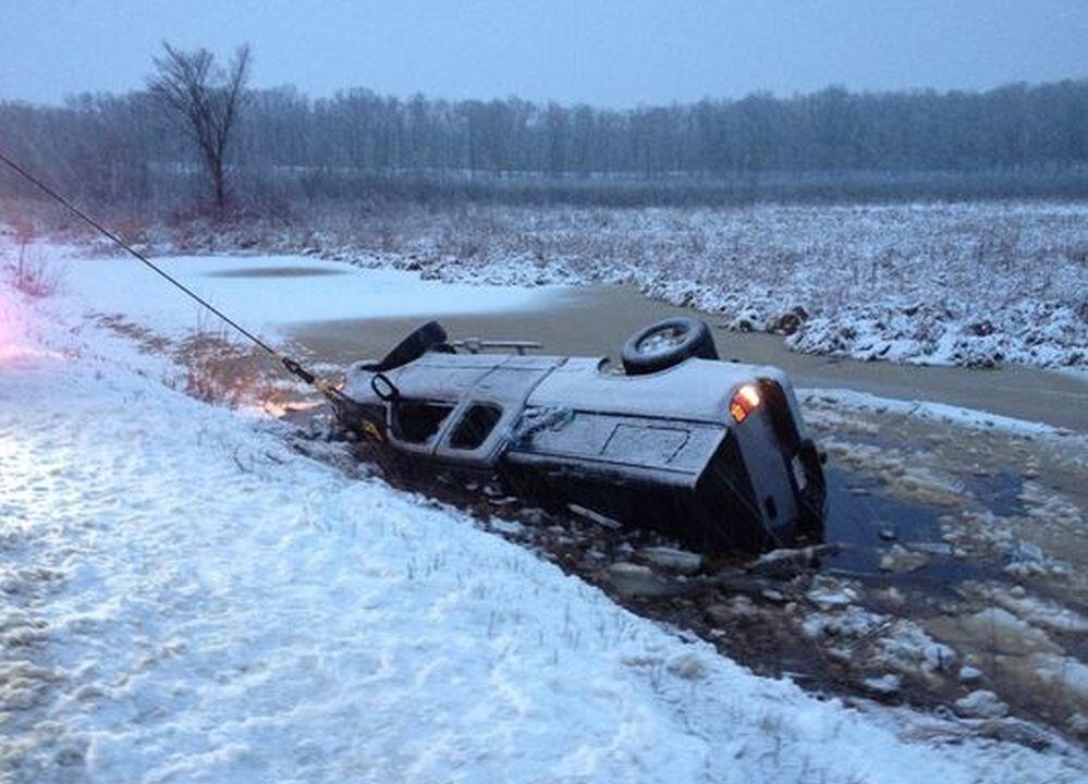 Mom and 5-Month-Old Baby Rescued From Car Overturned in Frozen Pond