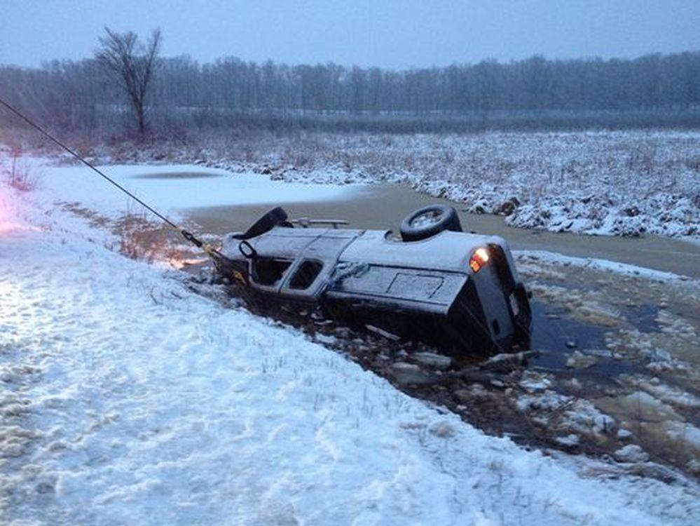 Mom and 5-Month-Old Baby Rescued From Car Overturned in Frozen Pond