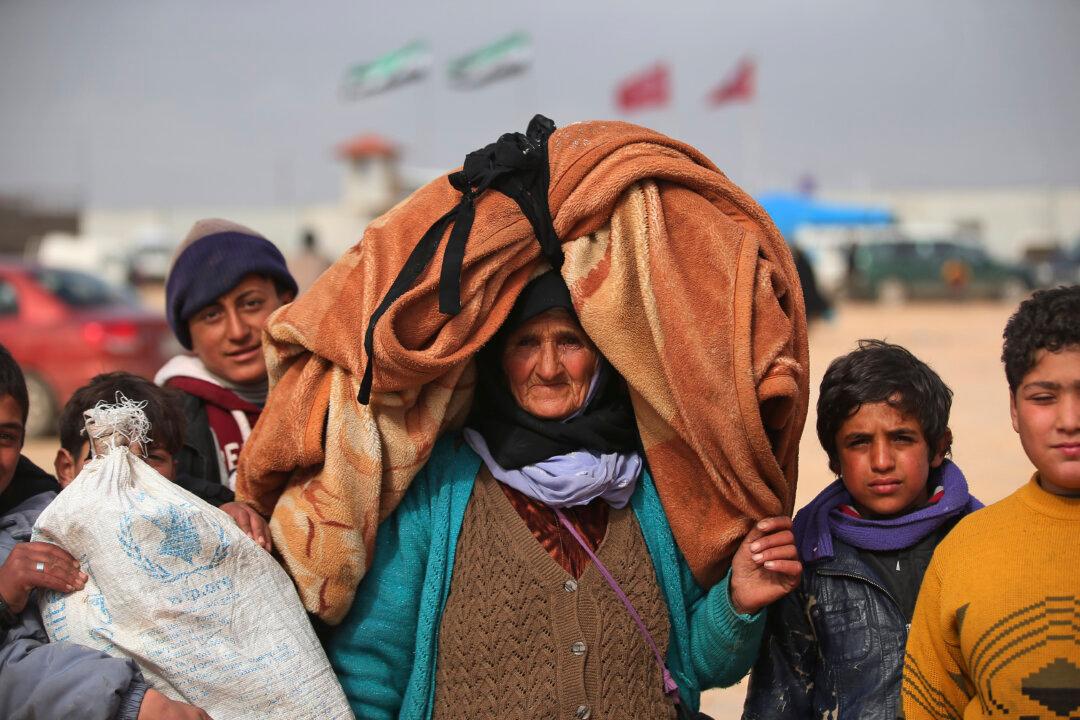 Turkey Under Pressure as Syrians Mass at Border